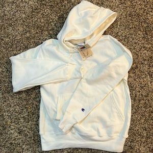 Cream colored Champion hoodie. New with tags. Size small